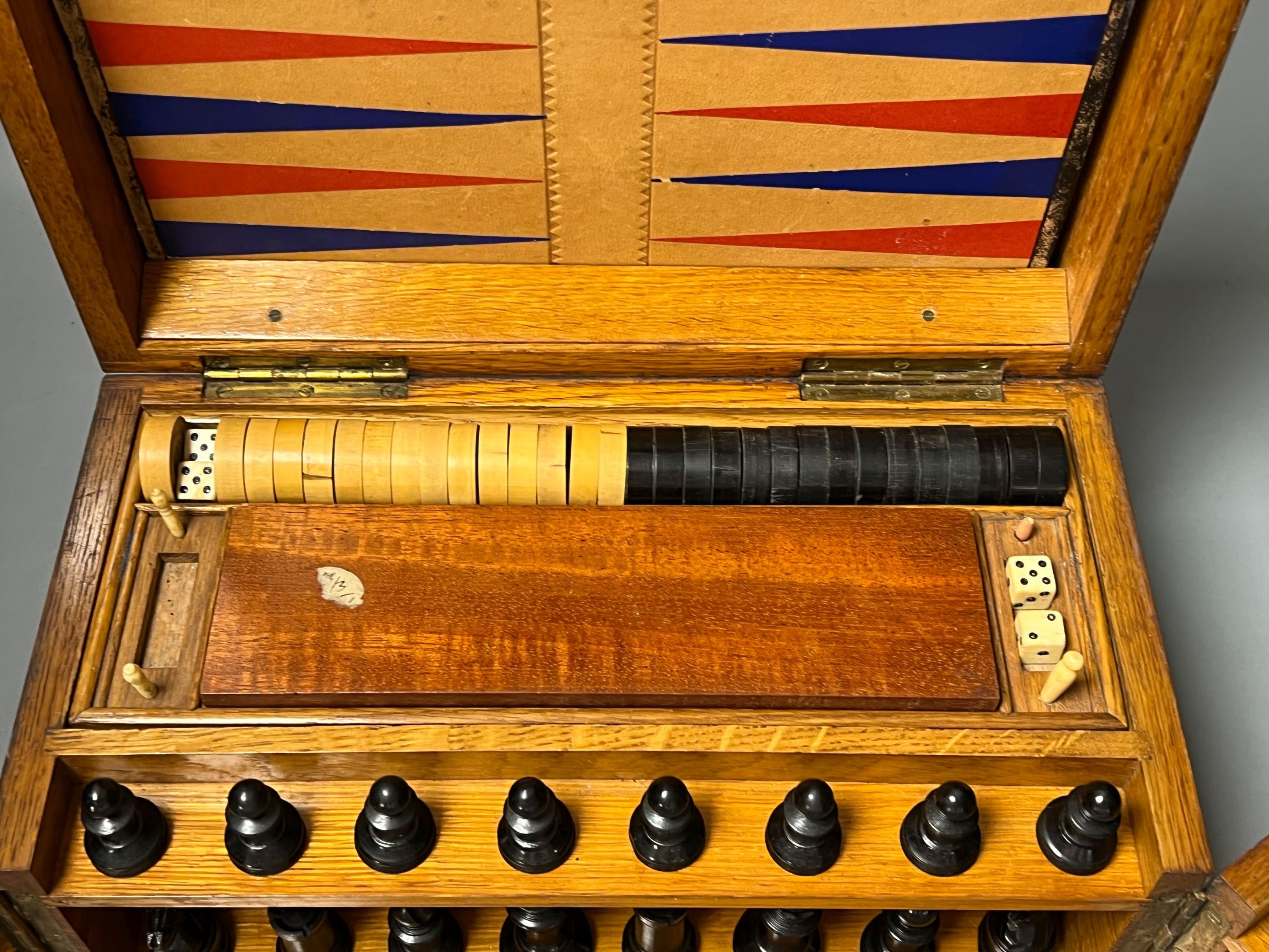 A Victorian oak games compendium, 32cm wide